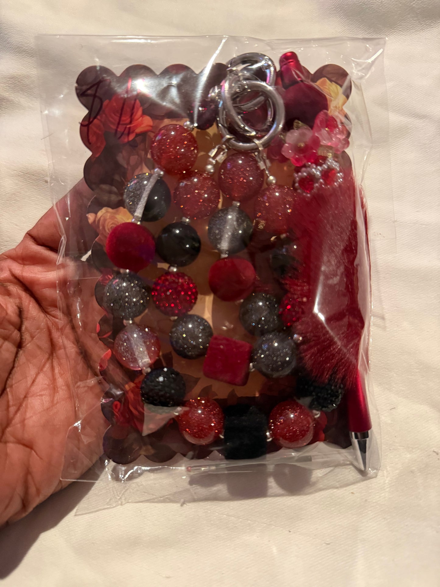 Assorted key chains with matching pens