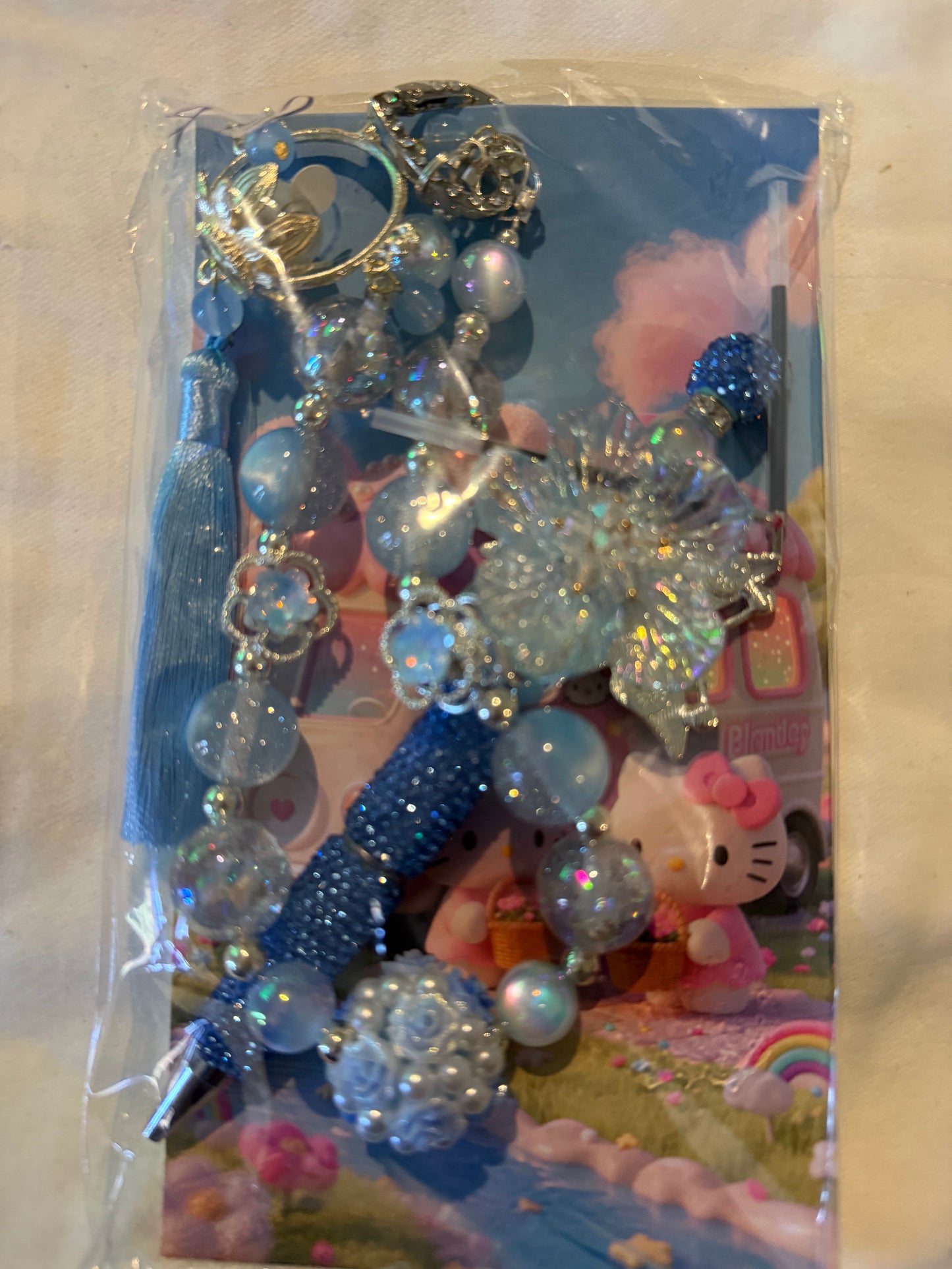 Assorted designs keychains with matching pens