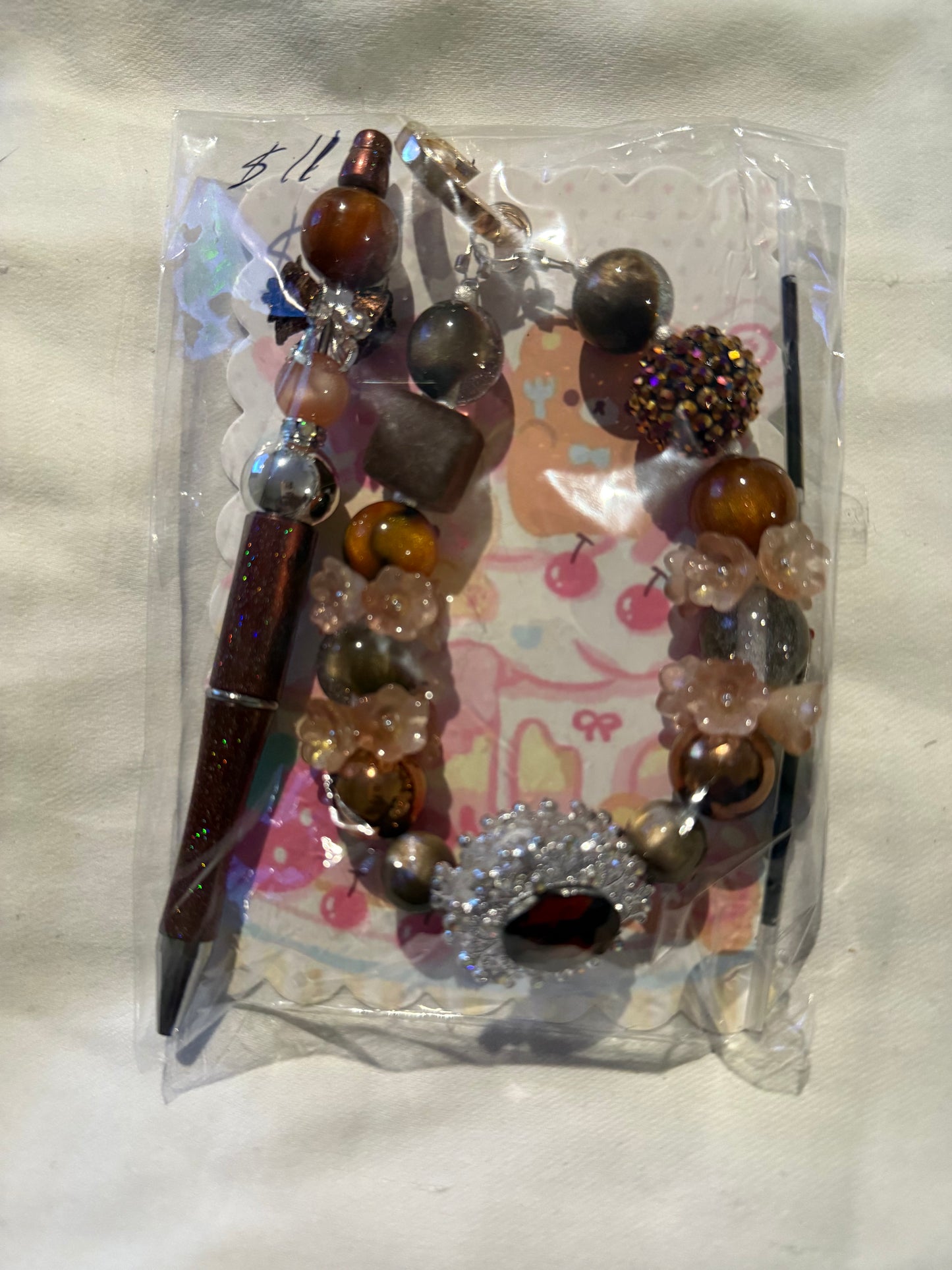 Assorted key chains with matching pens